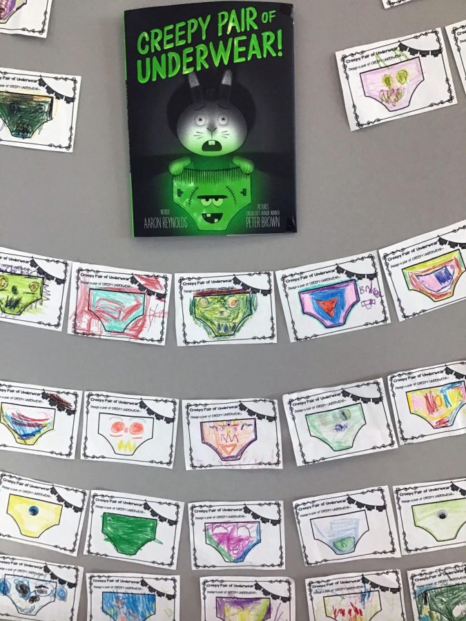 A wall of creepy underwear colored by scholars hangs in the library. 